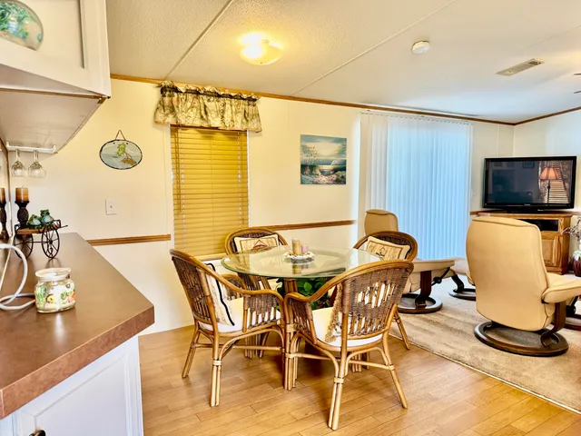 a view of a dining room with furniture