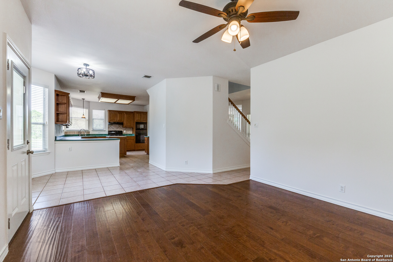 9109 Windwick Boerne, TX 78006 - Photo 12 of 35 a view of a kitchen with wooden floor and a kitchen