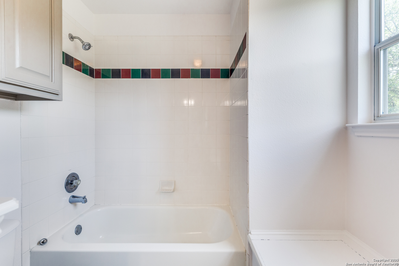 9109 Windwick Boerne, TX 78006 - Photo 27 of 35 a bathroom with a bathtub and a shower