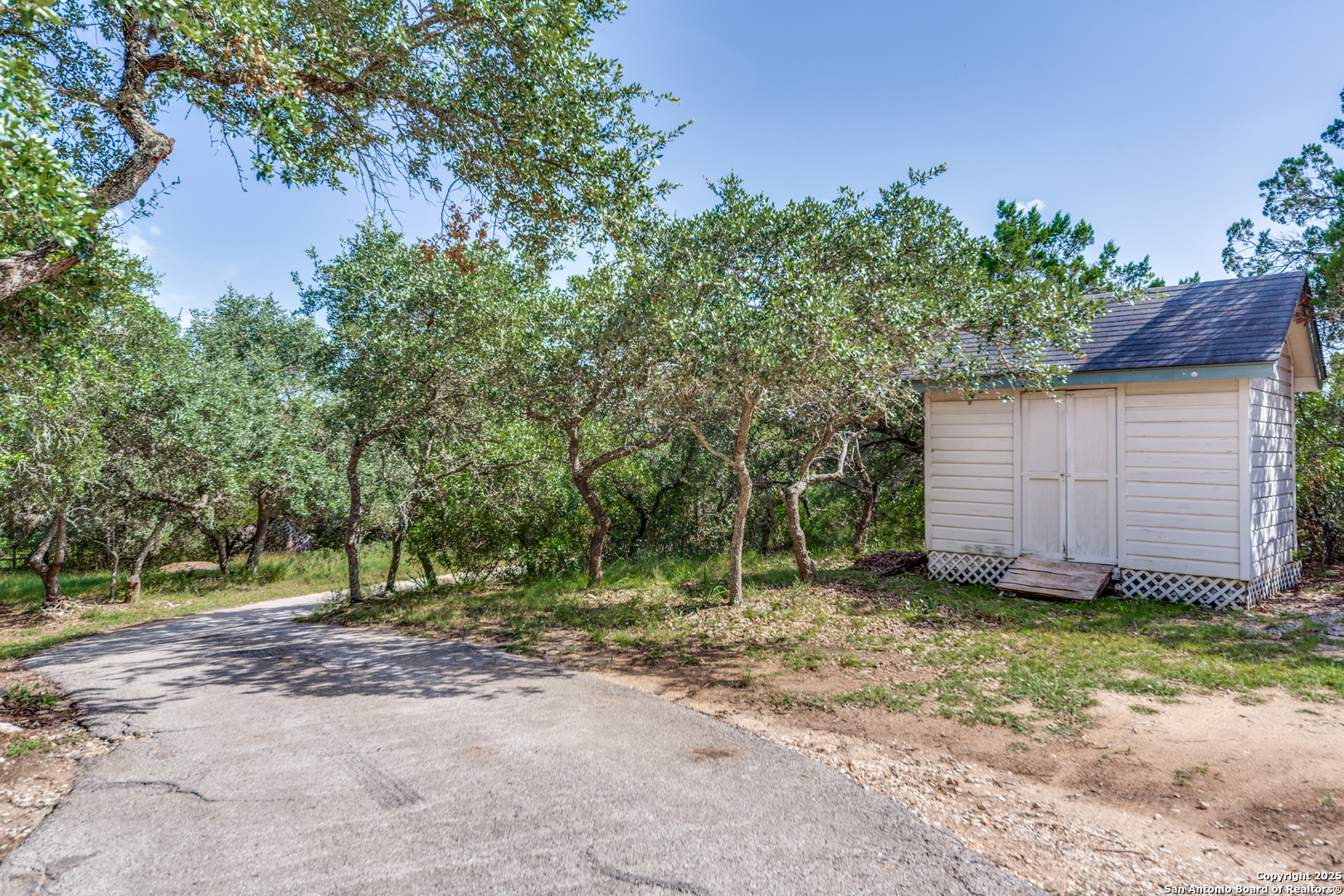 9109 Windwick Boerne, TX 78006 - Photo 32 of 35 a view of backyard with green space