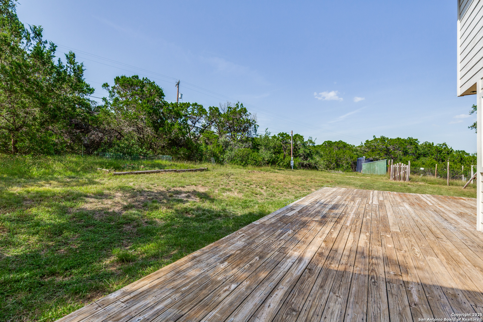 9109 Windwick Boerne, TX 78006 - Photo 33 of 35 a view of a yard with wooden floor