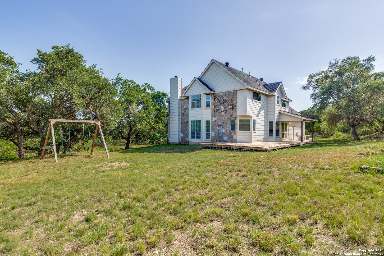 9109 Windwick Boerne, TX 78006 - Photo 34 of 35 a front view of a house with a yard