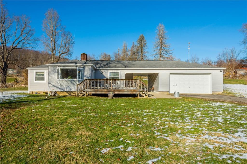231 Rehoboth Church Road Perryopolis, PA 15473 - Photo 1 of 25 a view of a house with a backyard