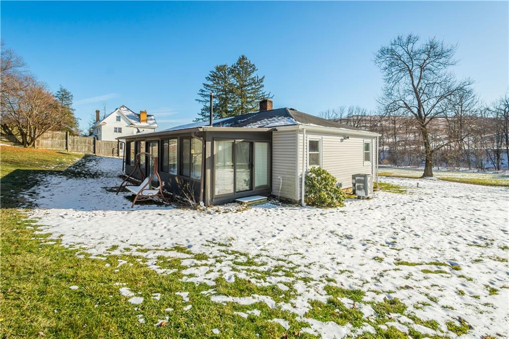 231 Rehoboth Church Road Perryopolis, PA 15473 - Photo 2 of 25 a view of a house with a yard covered with snow