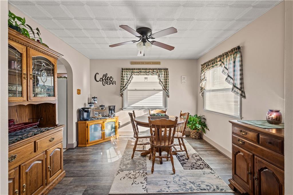 231 Rehoboth Church Road Perryopolis, PA 15473 - Photo 6 of 25 a view of a dining room with furniture window and wooden floor