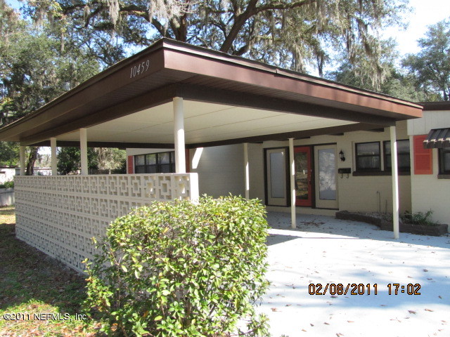 10459 Rutgers Road Jacksonville, FL 32218 - Photo 2 of 28 a view of a house with door