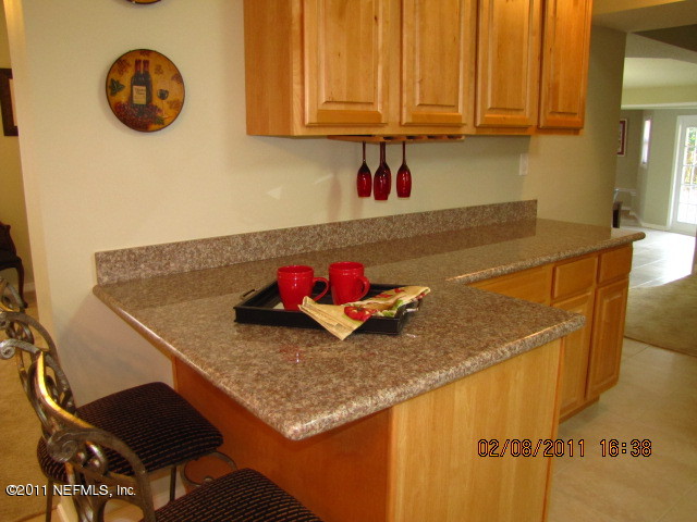 10459 Rutgers Road Jacksonville, FL 32218 - Photo 3 of 28 a view of a kitchen with a sink and cabinets