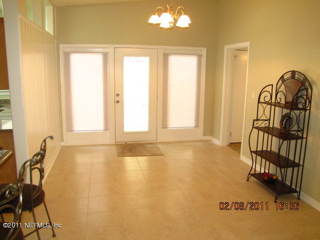 10459 Rutgers Road Jacksonville, FL 32218 - Photo 6 of 28 a view of an empty room and window
