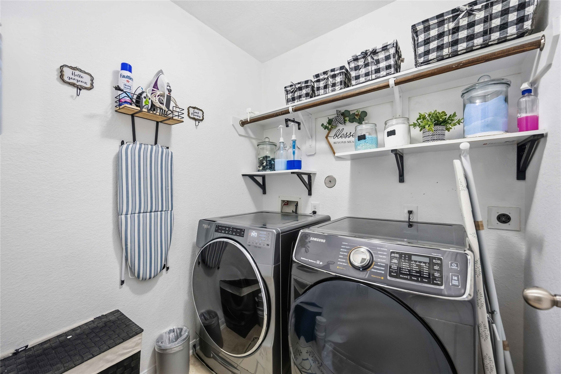 2139 Pacific Loon Lane Conroe, TX 77385 - Photo 21 of 21 Functional laundry room with built in shelving and organized storage space, offering convenience and efficiency for everyday living