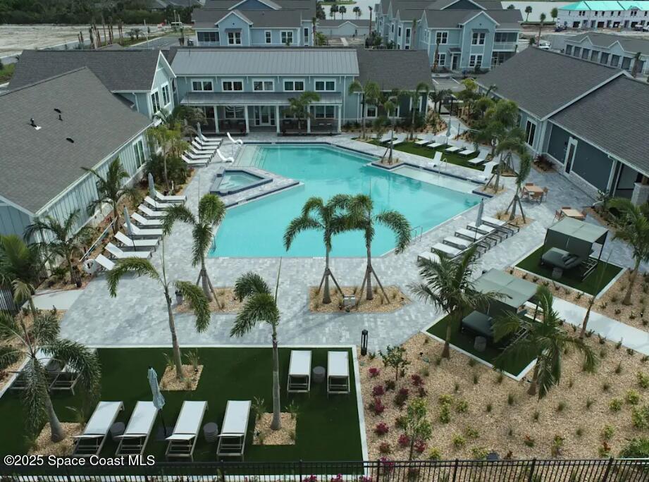 1073 Journey Circle, Unit 107 Rockledge, FL 32955 - Photo 2 of 10 an aerial view of a house having outdoor space