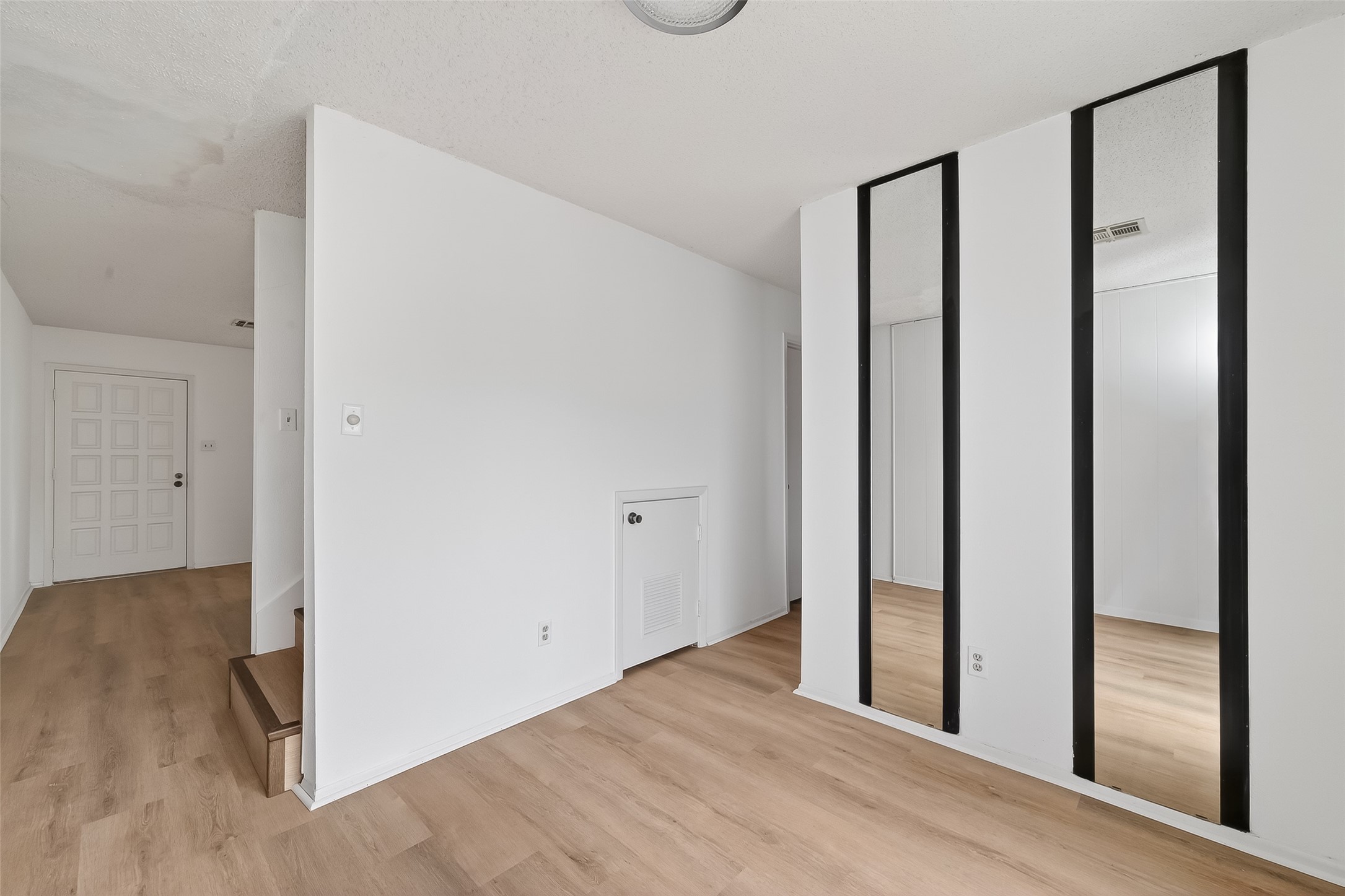 7861 Cook Road Houston, TX 77072 - Photo 9 of 20 a view of a room with wooden floor