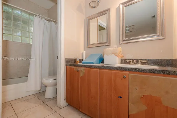 a bathroom with a sink and a toilet