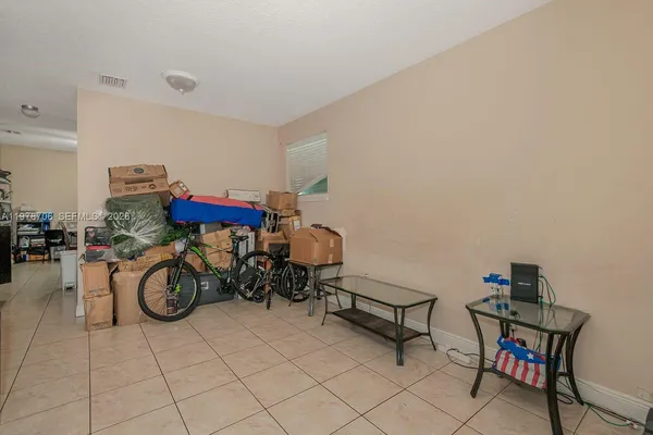 a view of storage and utility room with racks on the wall