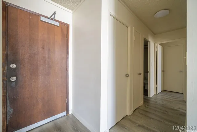 a view of a bathroom with wooden floor