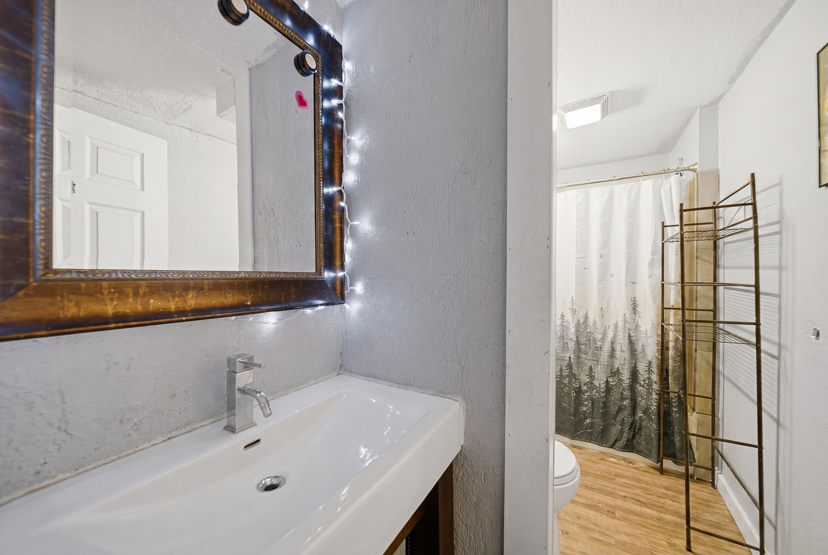 305 Monroe Avenue Dixon, IL 61021 - Photo 18 of 36 a bathroom with a sink and a mirror