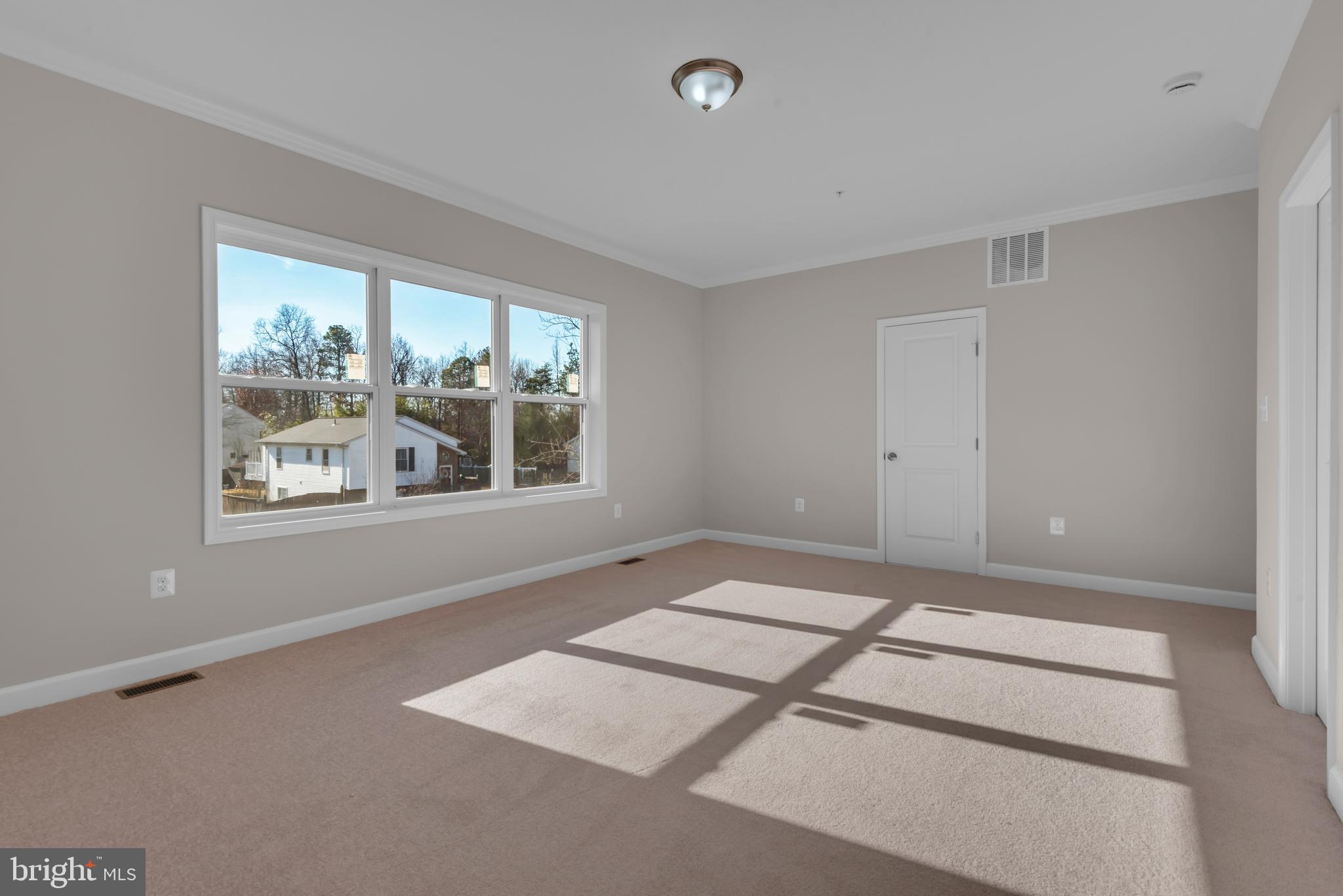 9912 Ridge Street Glenn Dale, MD 20769 - Photo 29 of 60 Owner's suite with crown molding