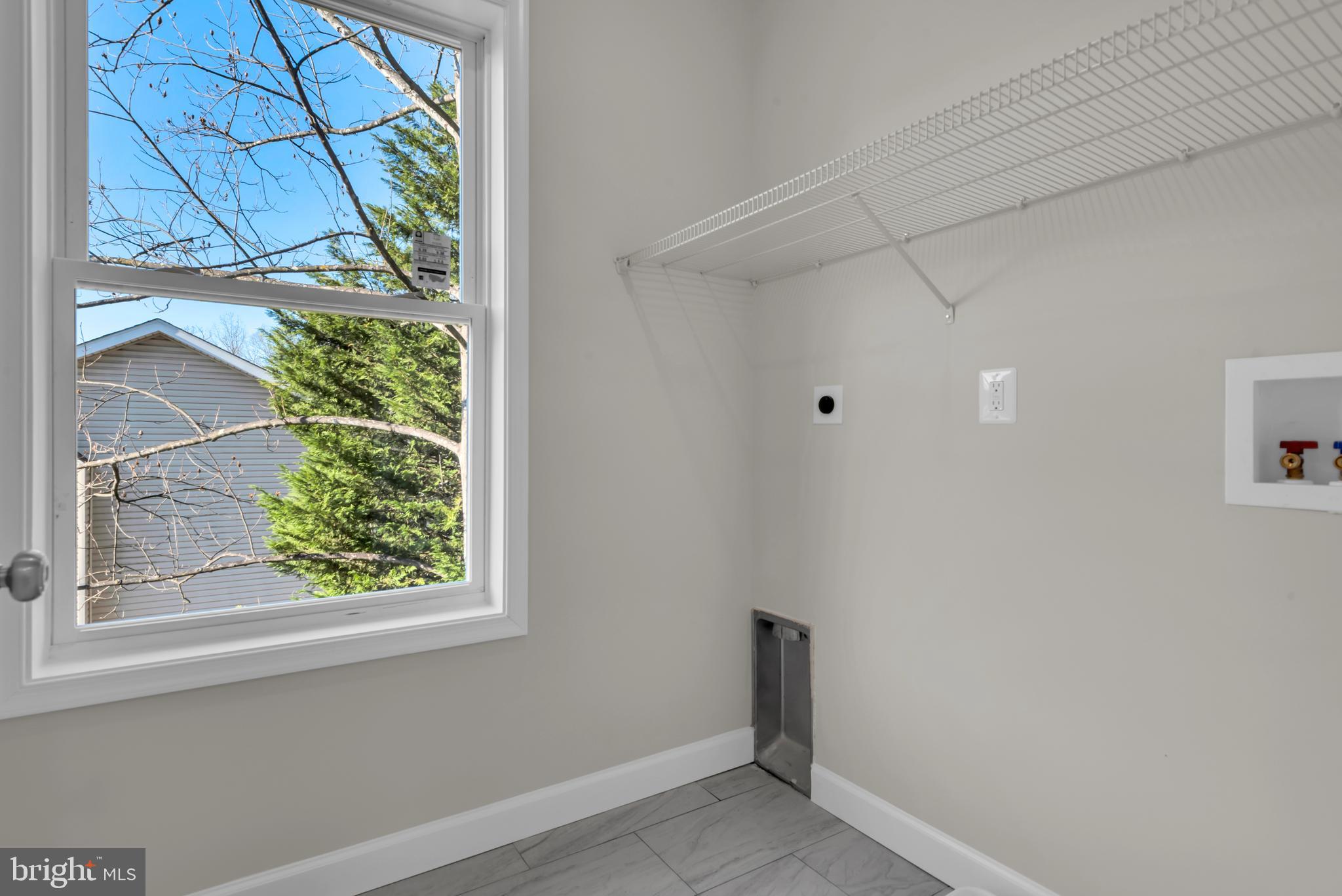 9912 Ridge Street Glenn Dale, MD 20769 - Photo 49 of 60 2nd floor clothes care center