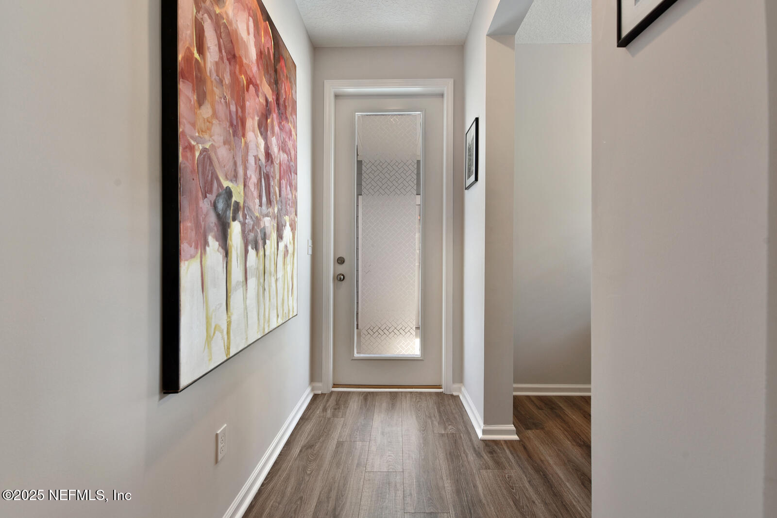 134 Jackrabbit Trail Ponte Vedra, FL 32081 - Photo 23 of 26 an empty room with wooden floor and a window