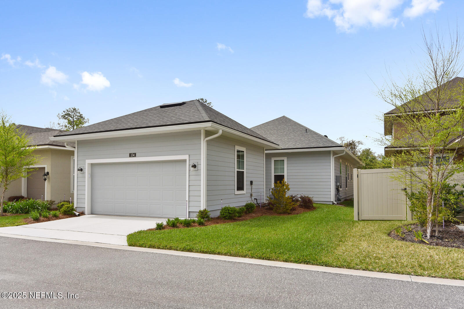 134 Jackrabbit Trail Ponte Vedra, FL 32081 - Photo 26 of 26 a front view of house with yard and green space