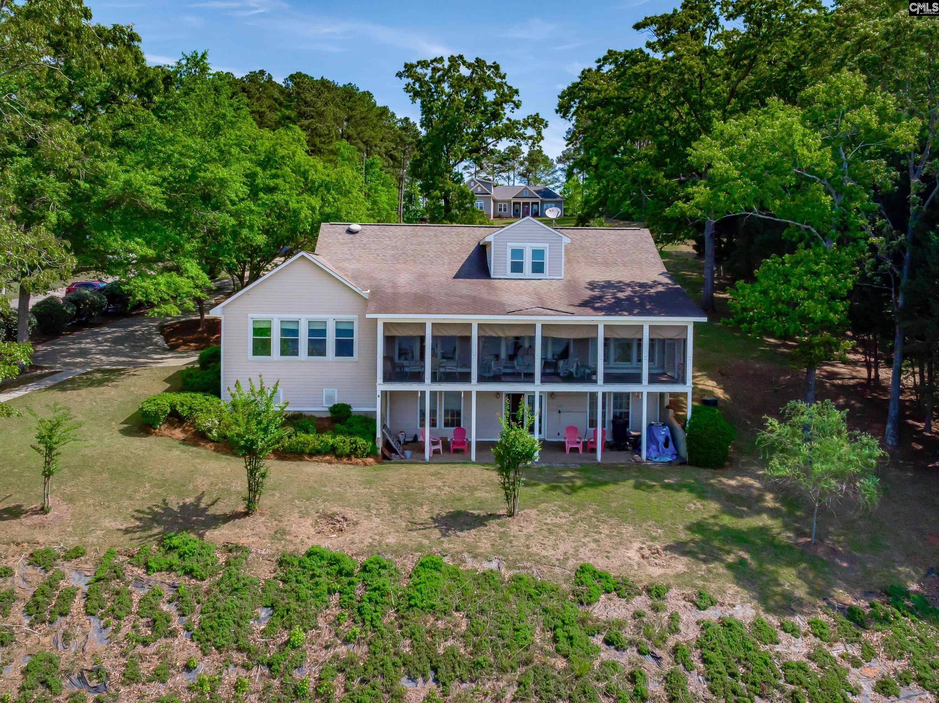 2577 Harbor View Road Camden, SC 29020 - Photo 41 of 42 a view of house with a yard