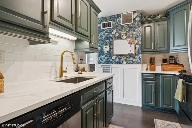 a kitchen with a sink and cabinets