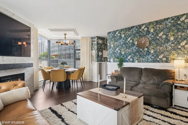 a dining room with furniture and window