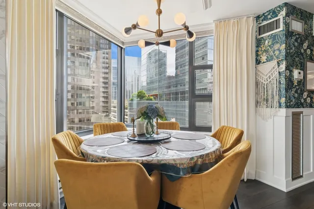 a kitchen with stainless steel appliances granite countertop a refrigerator stove and microwave