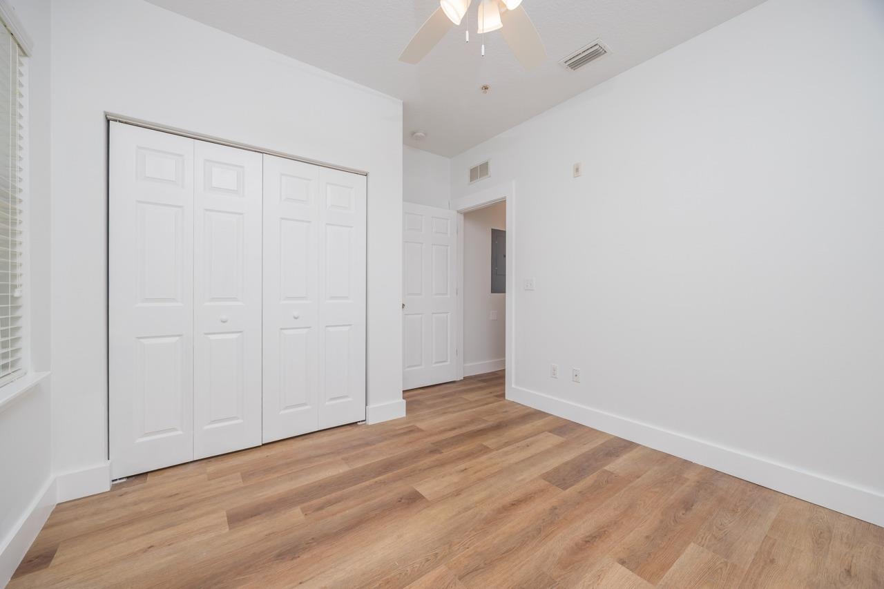 2310 Golden Lake Loop St. Augustine, FL 32084 - Photo 25 of 34 wooden floor in an empty room