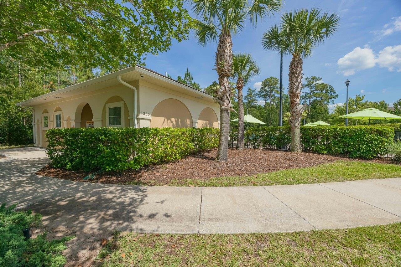 2310 Golden Lake Loop St. Augustine, FL 32084 - Photo 28 of 34 a front view of a house with garden