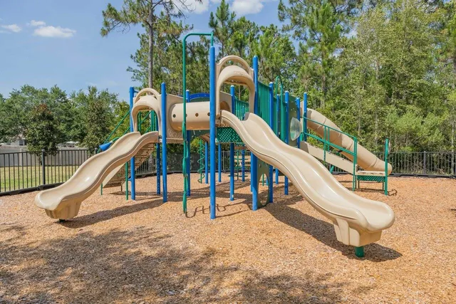 a view of a house with a park