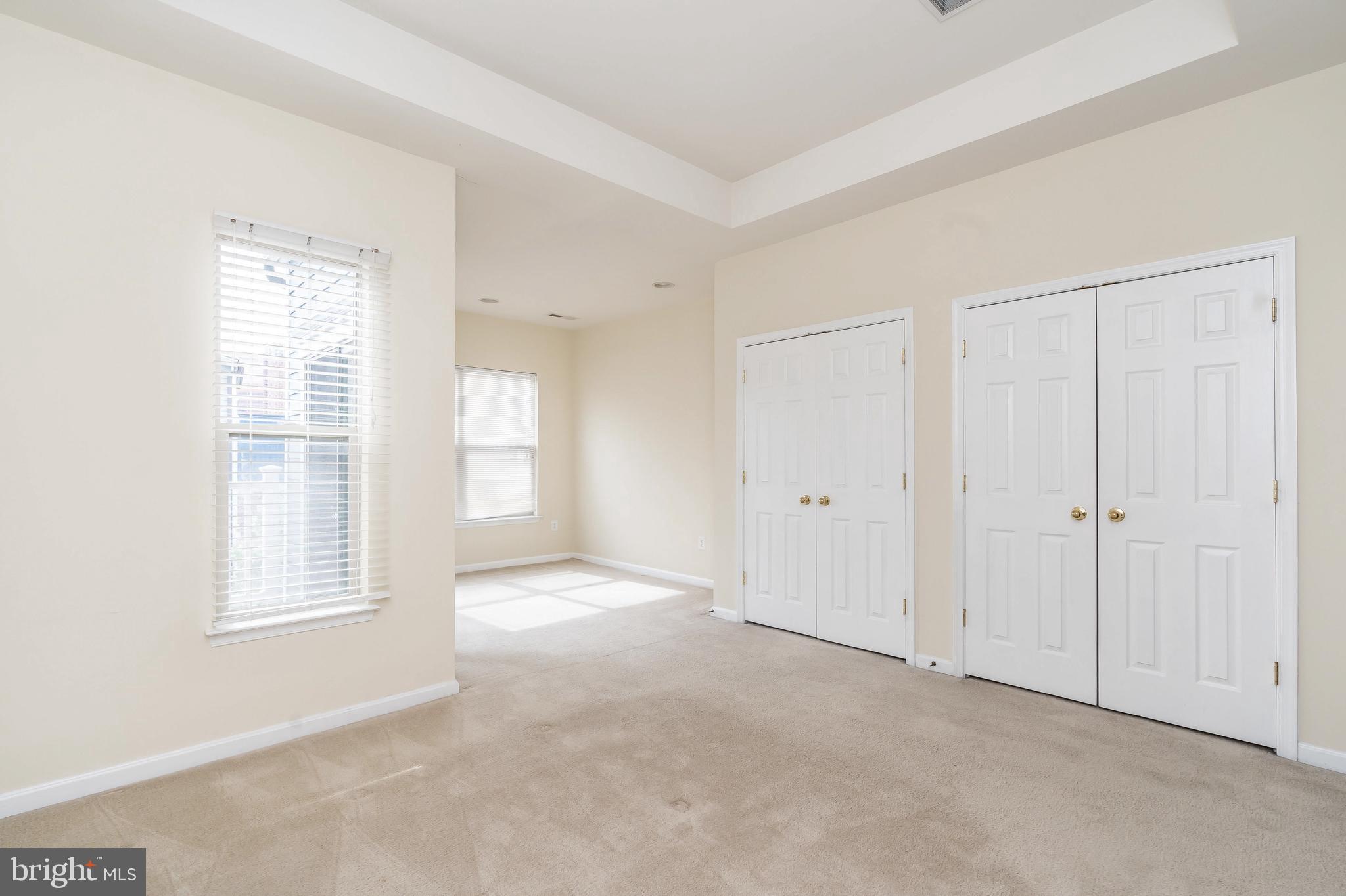 8 South Exeter Street, Unit 142 Baltimore, MD 21202 - Photo 28 of 43 Owners Suite w/ double closets