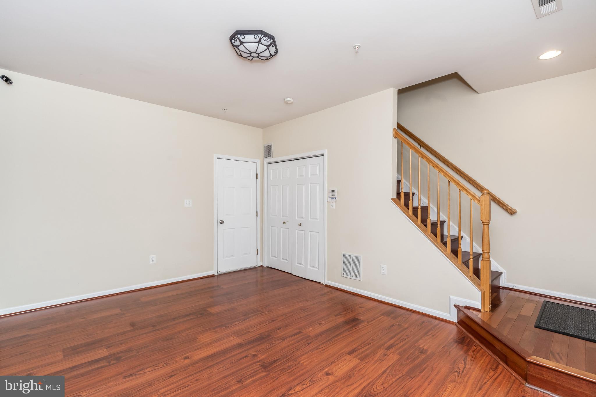 8 South Exeter Street, Unit 142 Baltimore, MD 21202 - Photo 5 of 43 Step into the Family Room from the Garage