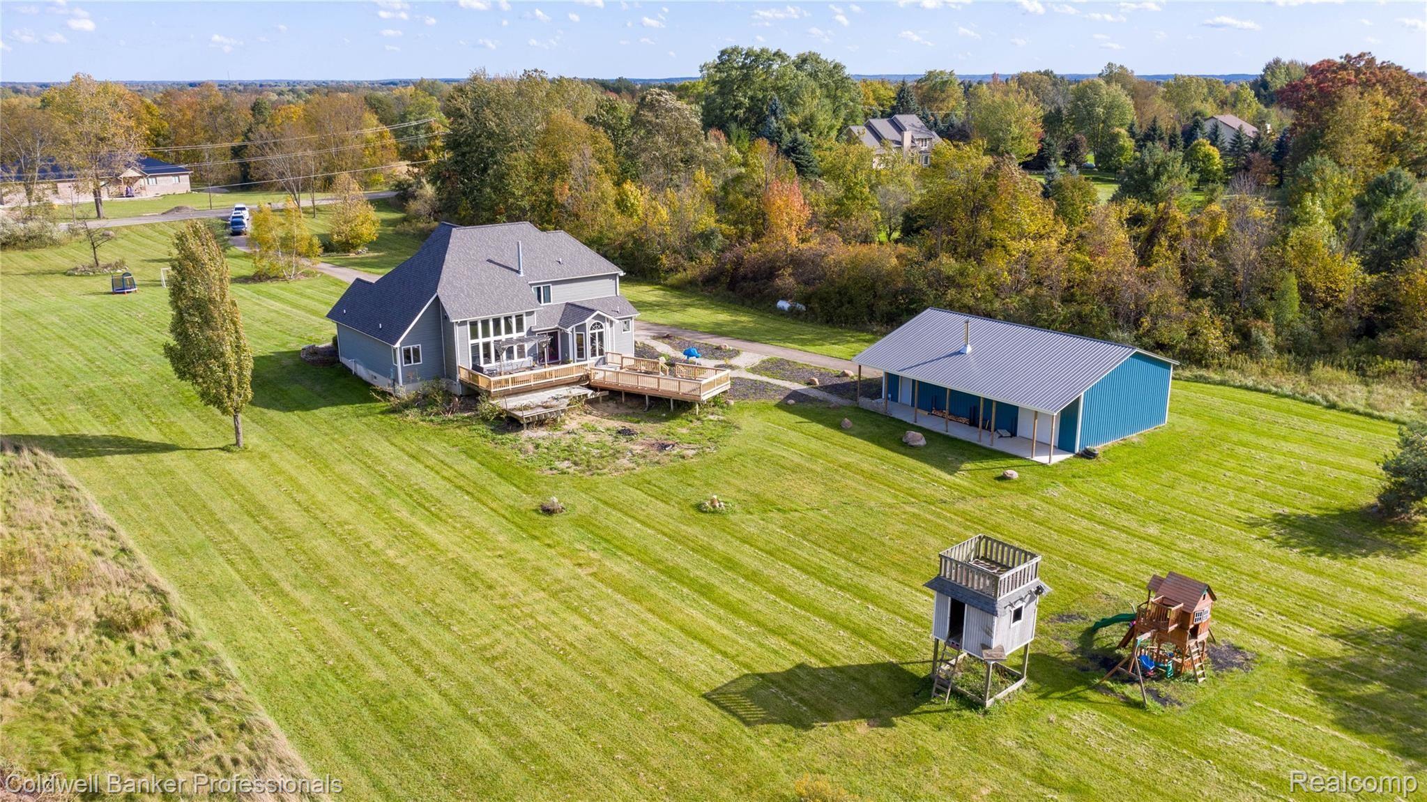173 North Hayes Road Lapeer, MI 48446 - Photo 29 of 38 Back lot view of Home/Pole Barn