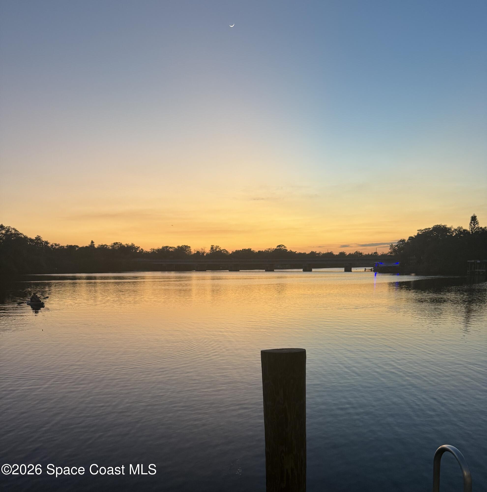 1465 Windchime Lane Melbourne, FL 32935 - Photo 13 of 17 a view of lake