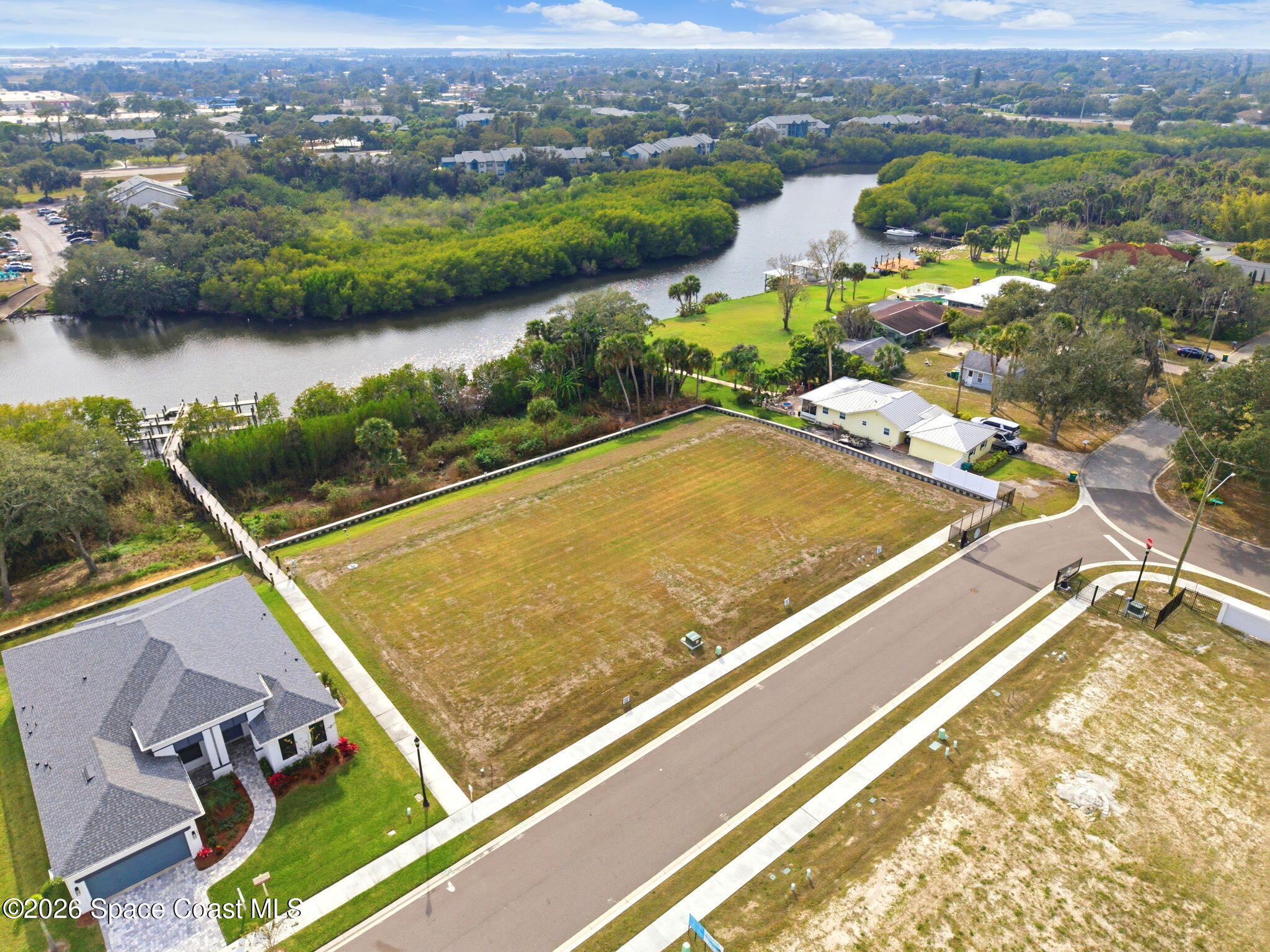 1465 Windchime Lane Melbourne, FL 32935 - Photo 4 of 17 an aerial view of swimming pool and mountain view