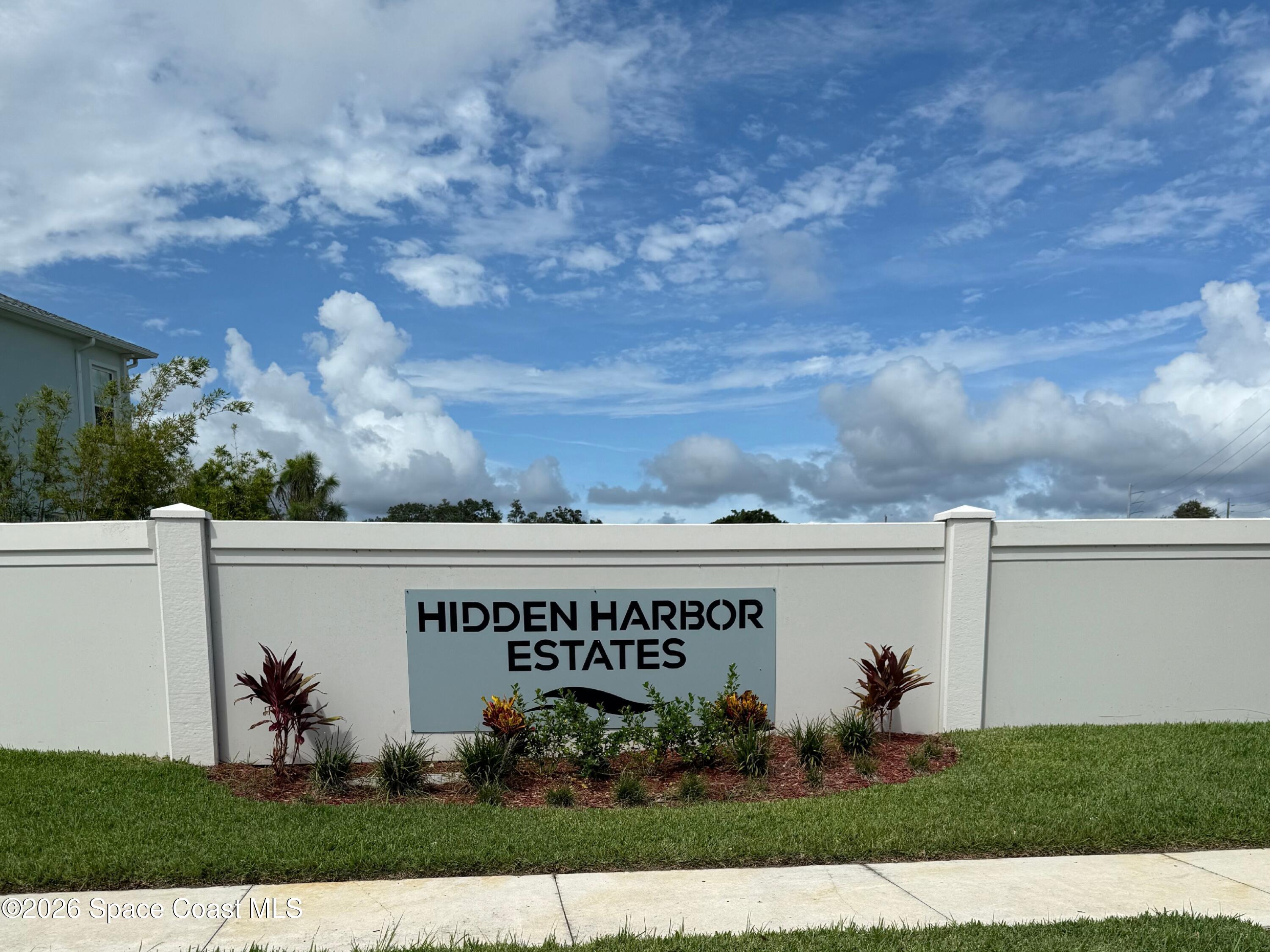 1465 Windchime Lane Melbourne, FL 32935 - Photo 5 of 17 front view of house with a yard