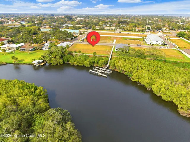 a view of an ocean and a mountain
