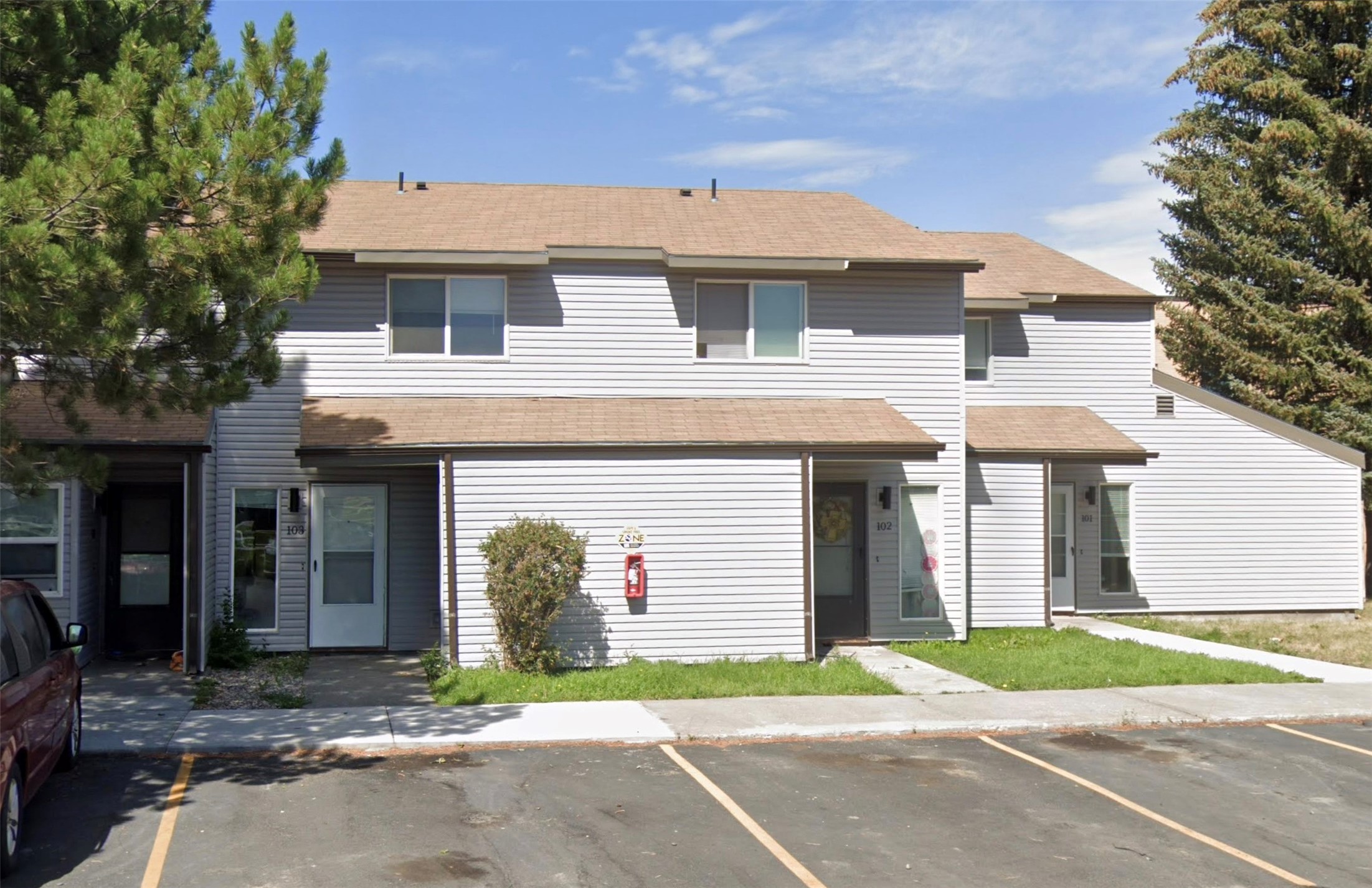 2867 East 680 North Roberts, ID 83444 - Photo 5 of 6 a front view of a house with a yard and a garage