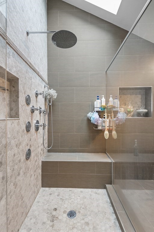 106 Windsor Road Needham, MA 02492 - Photo 13 of 37 a bathroom with a bathtub