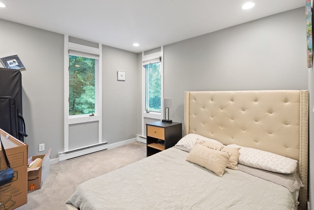 106 Windsor Road Needham, MA 02492 - Photo 16 of 37 a bedroom with a large bed and a window