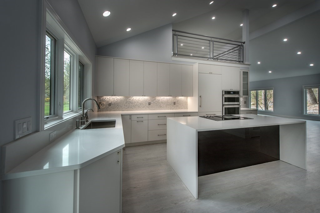 106 Windsor Road Needham, MA 02492 - Photo 21 of 37 a kitchen with a sink and stove