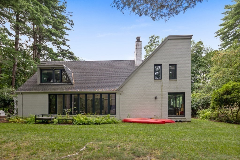 106 Windsor Road Needham, MA 02492 - Photo 32 of 37 a front view of a house with a yard