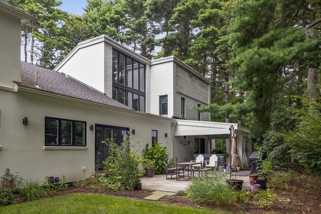 106 Windsor Road Needham, MA 02492 - Photo 37 of 37 a view of a house with backyard and sitting area