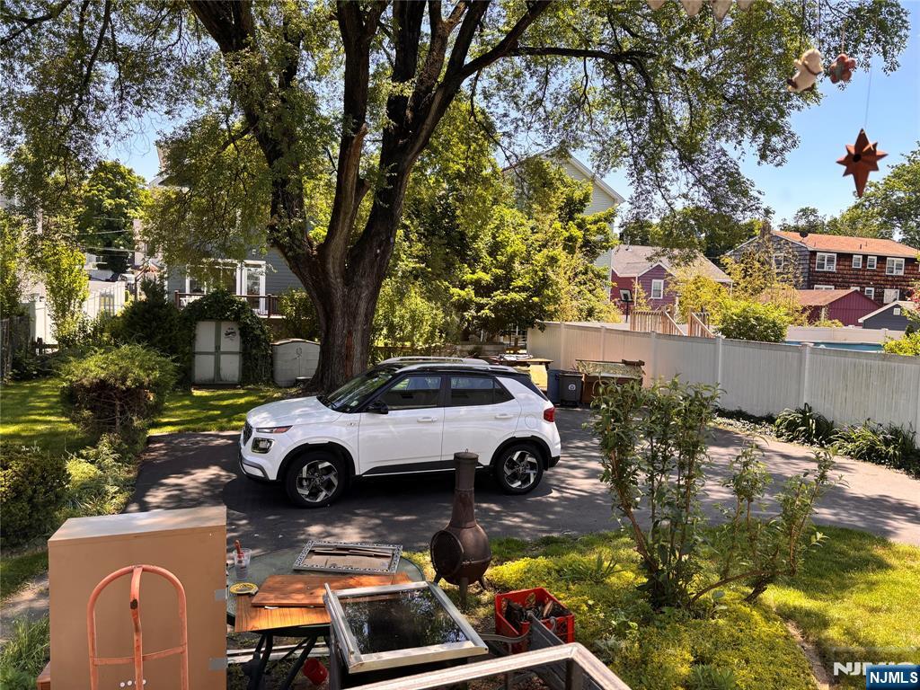 21 Wanamaker Avenue, Unit 1 Waldwick, NJ 07463 - Photo 13 of 13 a car parked in front of a house