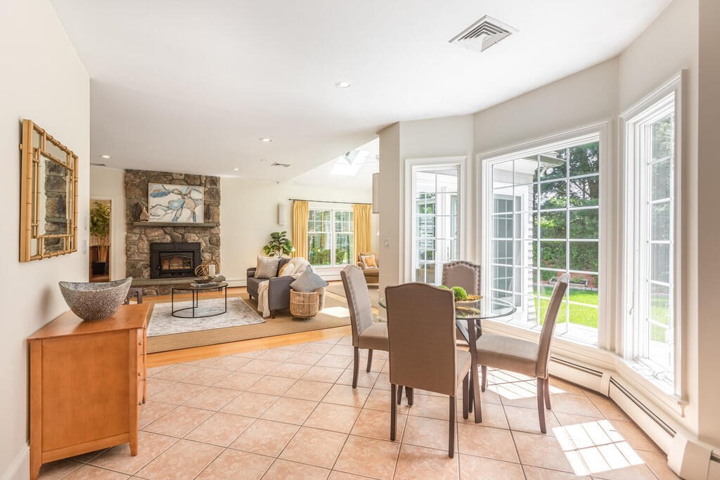 4 Hampton Road Lexington, MA 02421 - Photo 12 of 30 a living room with furniture and a fireplace