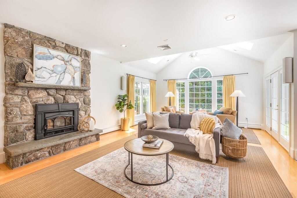 4 Hampton Road Lexington, MA 02421 - Photo 14 of 30 a living room with furniture and a fireplace