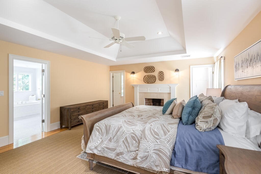 4 Hampton Road Lexington, MA 02421 - Photo 17 of 30 a bedroom with a bed and wooden floor