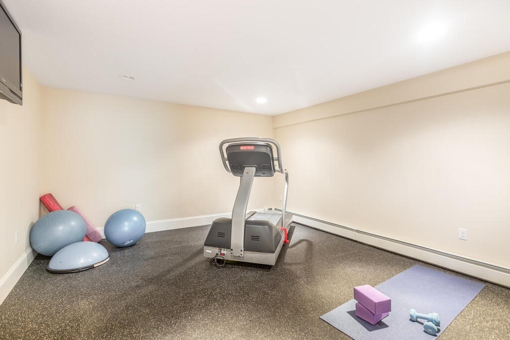 4 Hampton Road Lexington, MA 02421 - Photo 25 of 30 a room with gym equipment