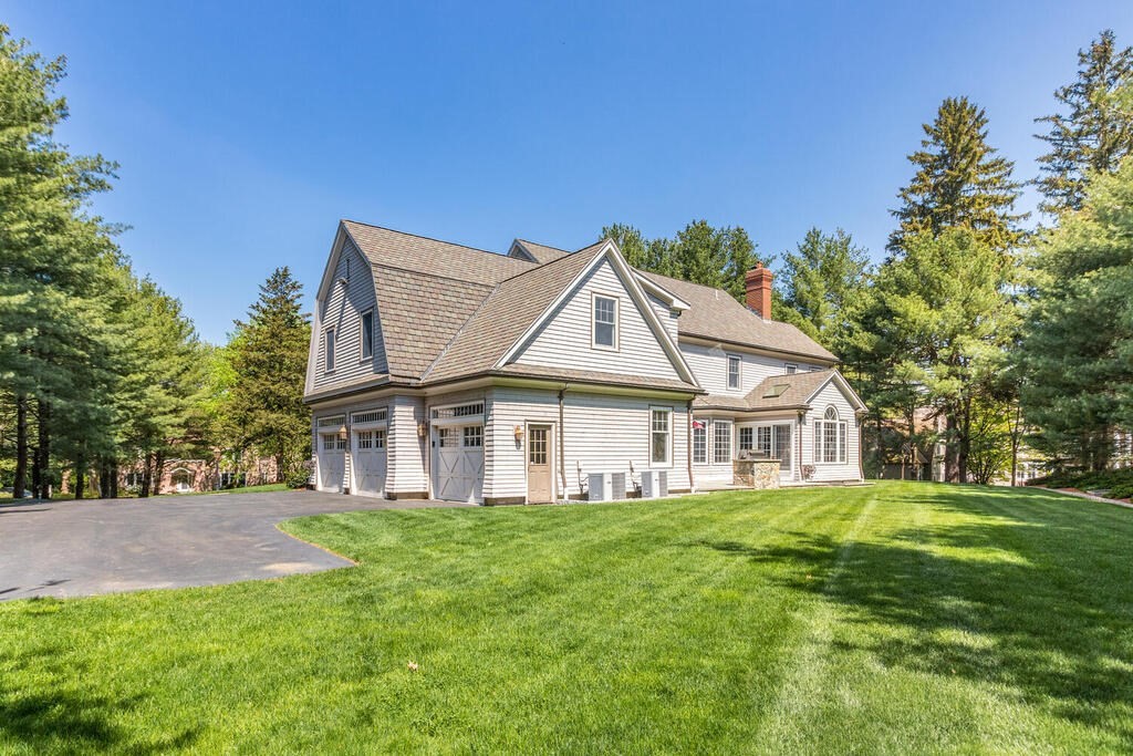 4 Hampton Road Lexington, MA 02421 - Photo 28 of 30 a view of a house with a big yard potted plants and large tree