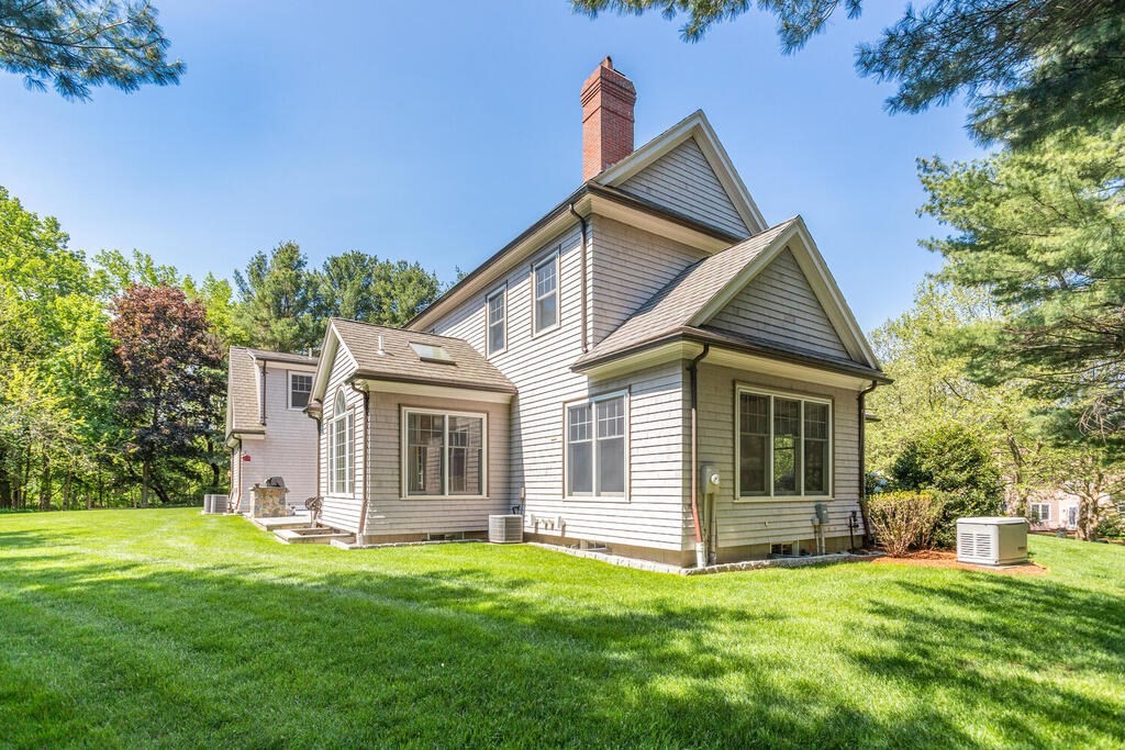 4 Hampton Road Lexington, MA 02421 - Photo 29 of 30 a front view of a house with a yard